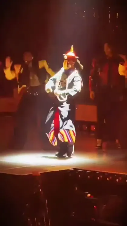 Talk Dirty dance stage composition showing a lead performer and group